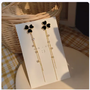 Black clover gold-tone long chain tassel earrings, one pair