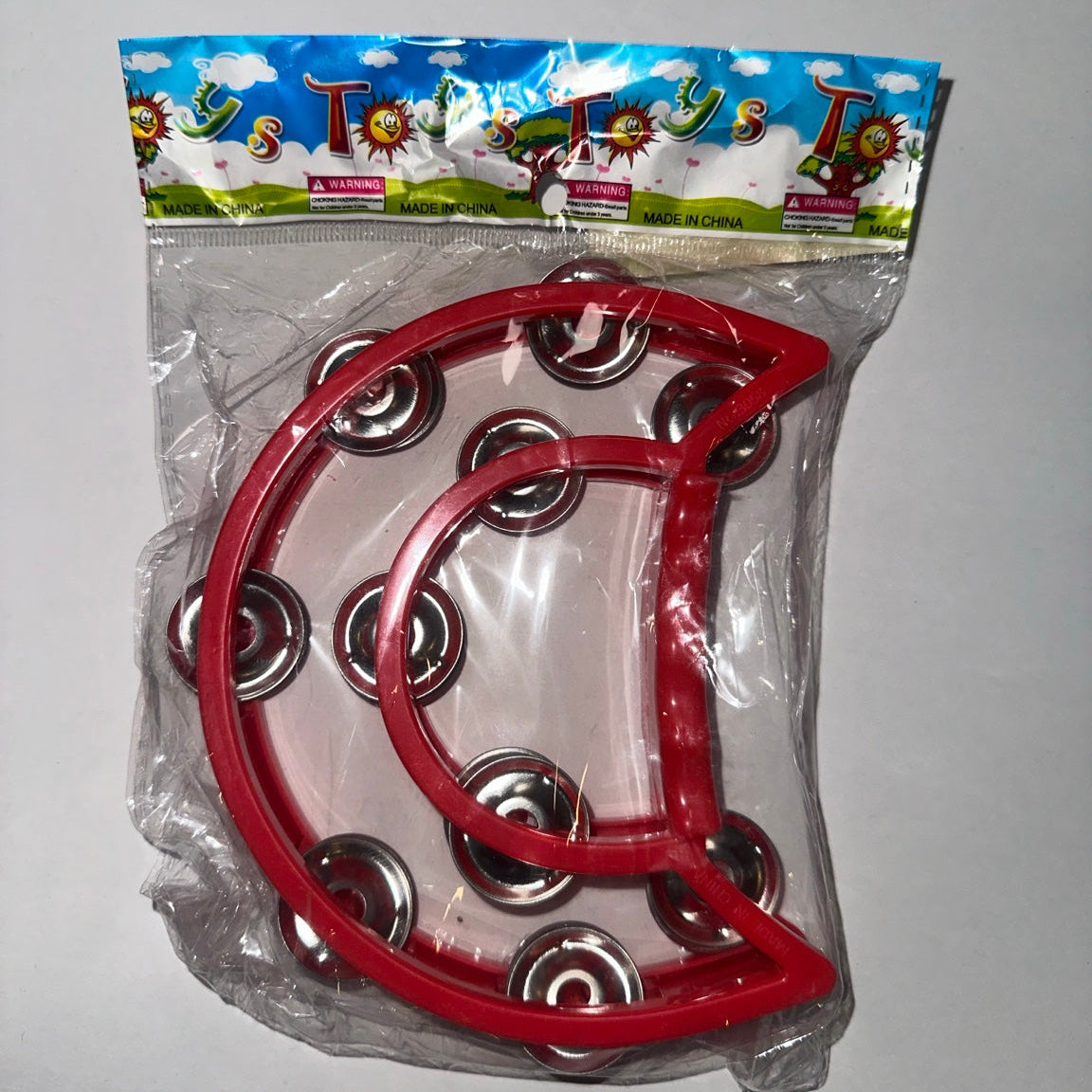 Kids Musical Tambourine – Red Half-Moon Handheld Jingle Instrument packaging photo