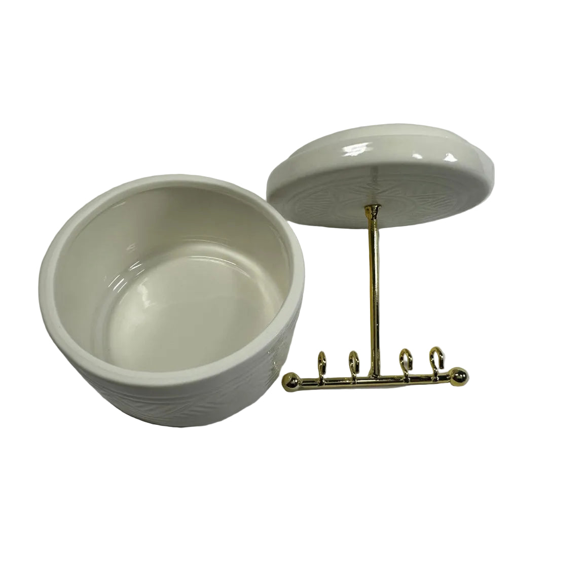 White jewellery organizer lid lifted showing round storage compartment