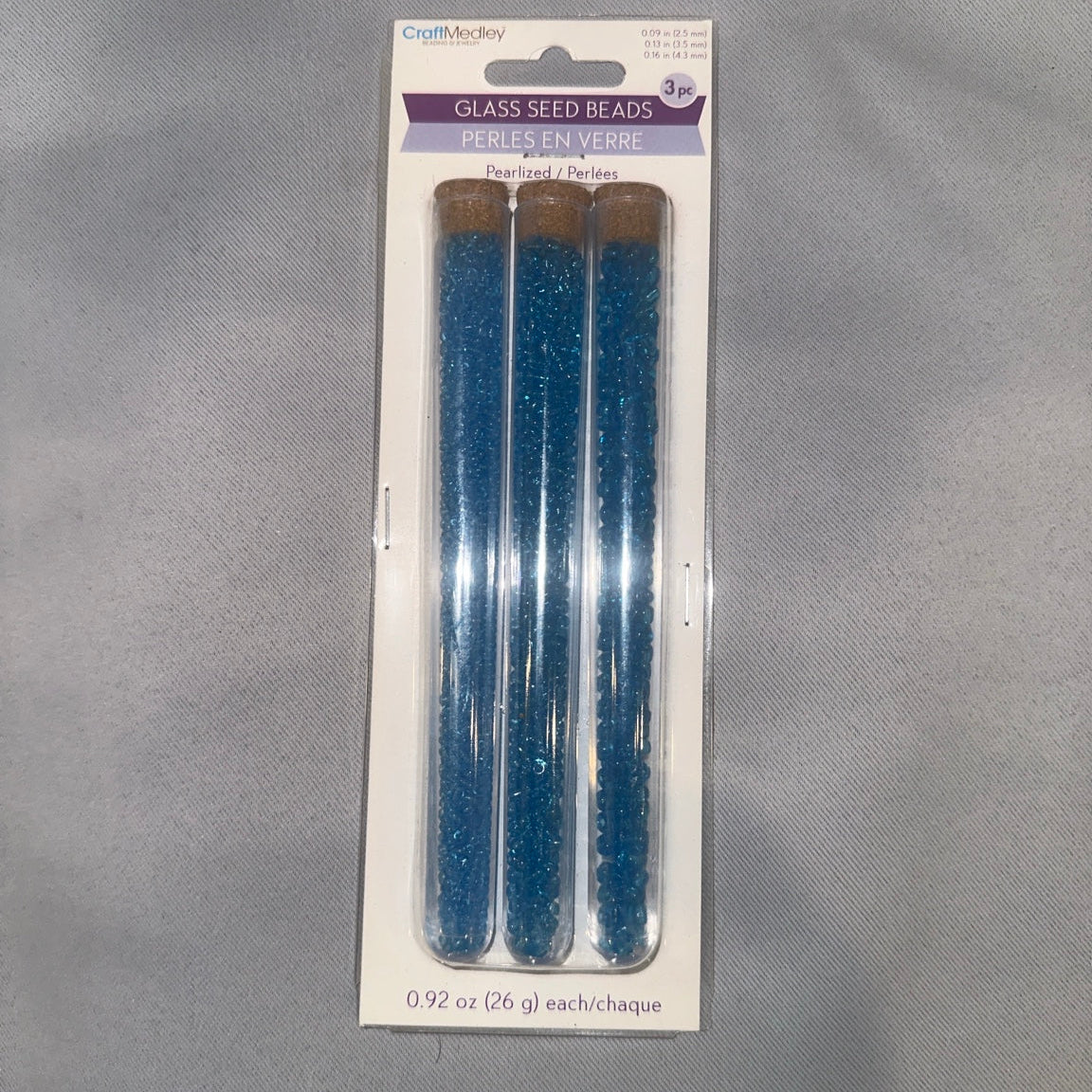 CraftMedley pearized blue glass seed beads front