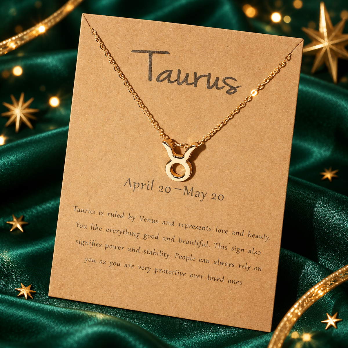 Taurus zodiac necklace on a star-themed satin background