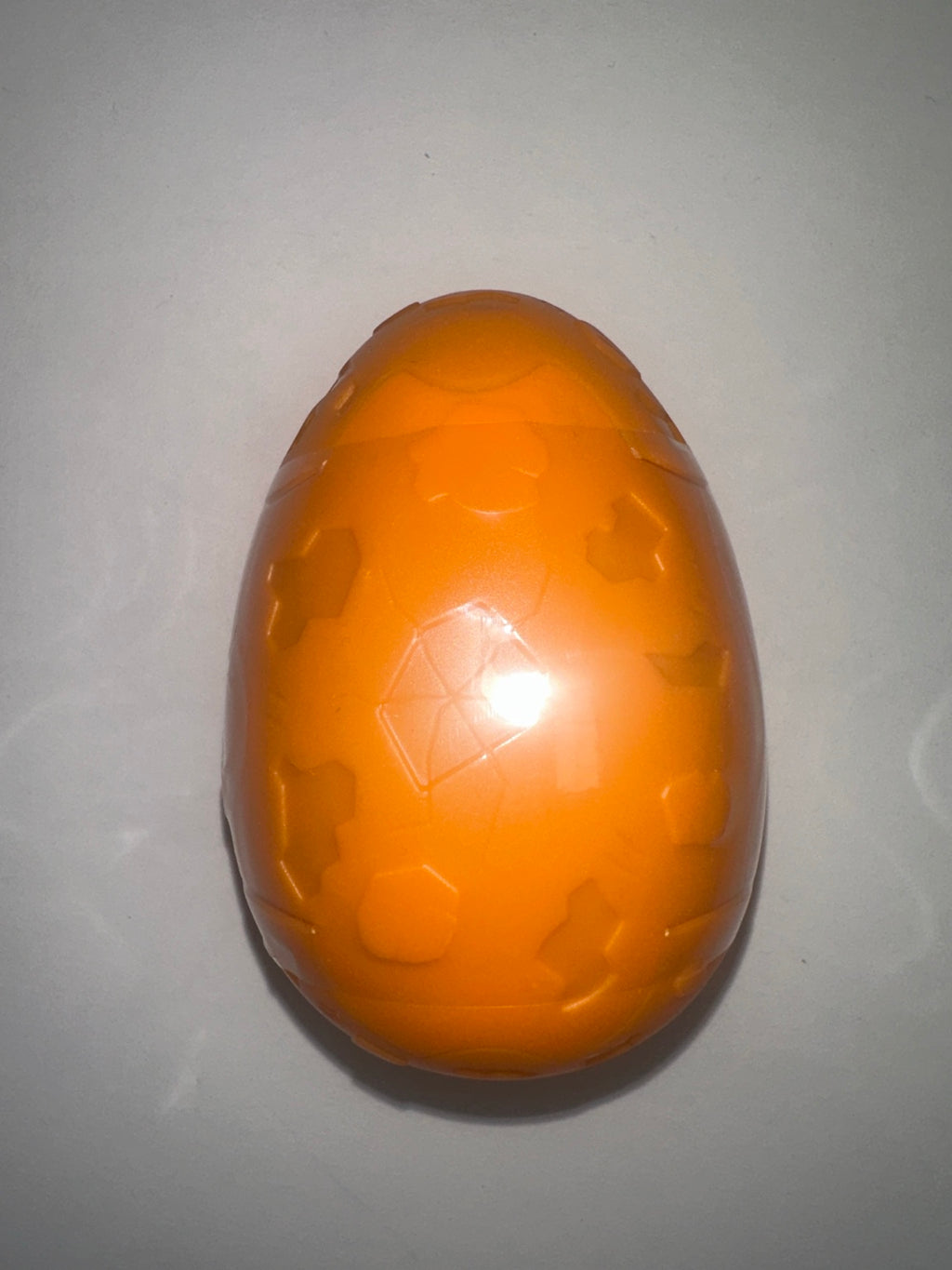 Single orange Burst Egg surprise toy