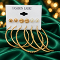 Gold-Tone Textured Hoop and Stud Earrings – 6-Pair Assorted Set on decorative coloured satin background