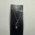Necklace featuring silver loop pearl pendant