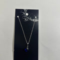 Necklace featuring dark blue heart pendant
