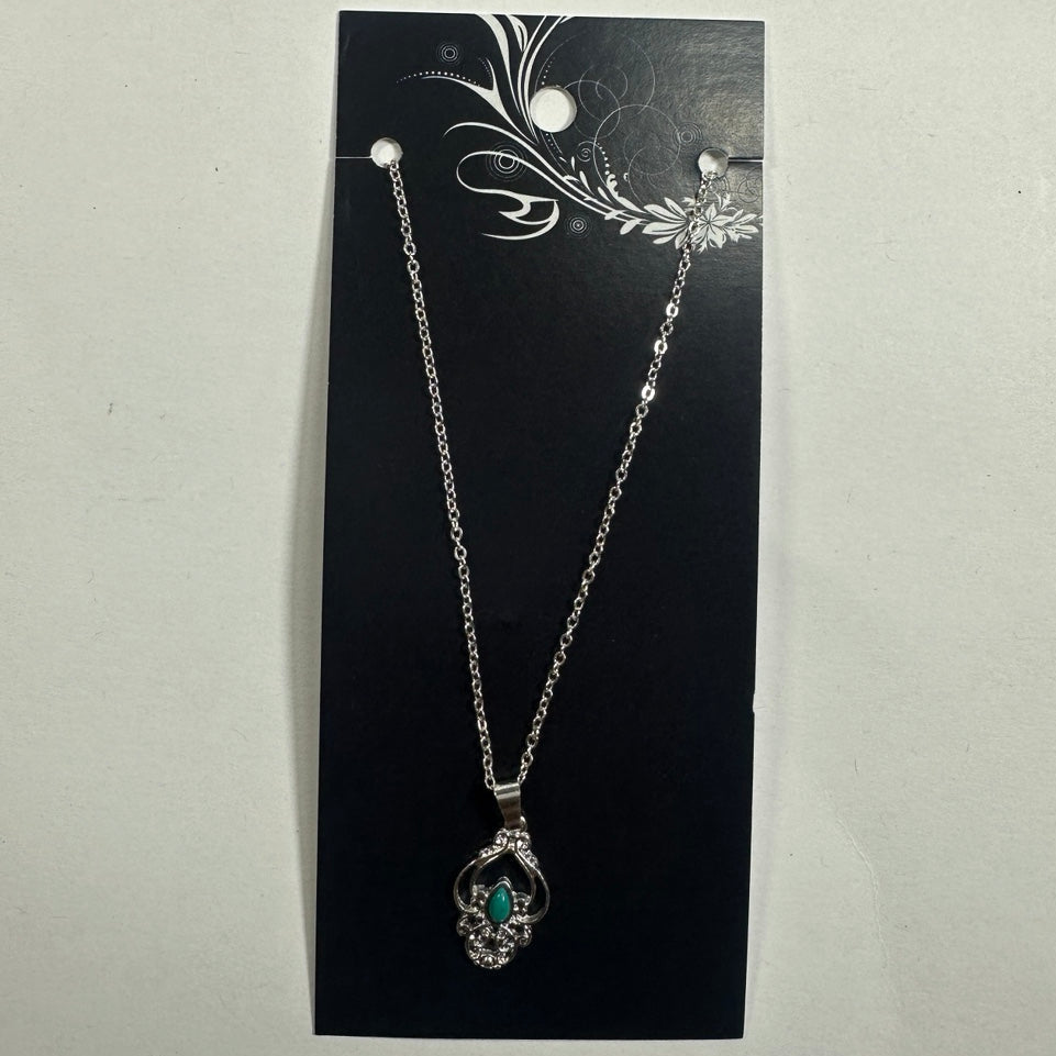 Necklace featuring green accent floral pendant