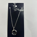 Necklace featuring silver concentric circle pendant