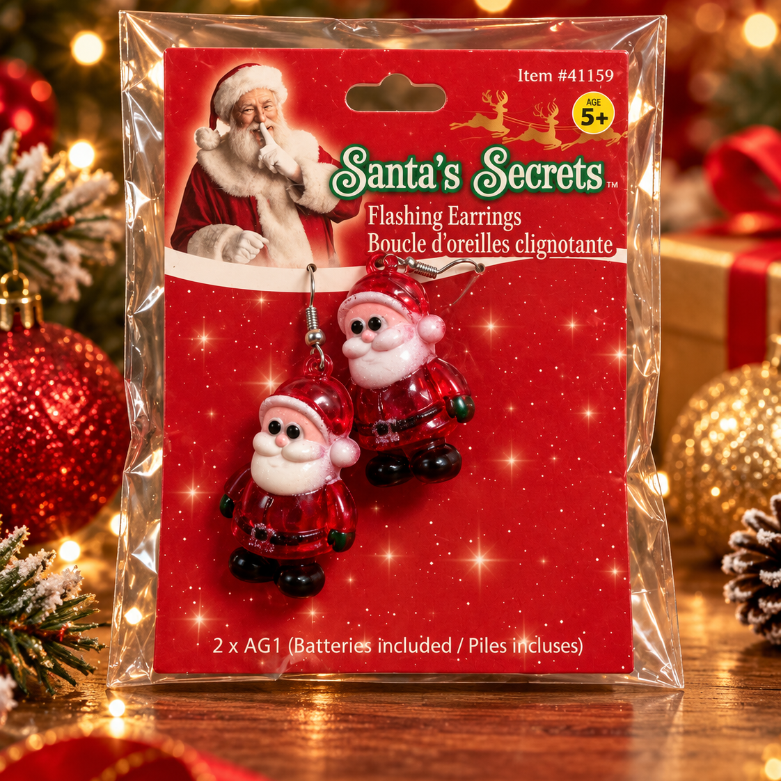 Santa flashing earrings in original packaging against festive Christmas background