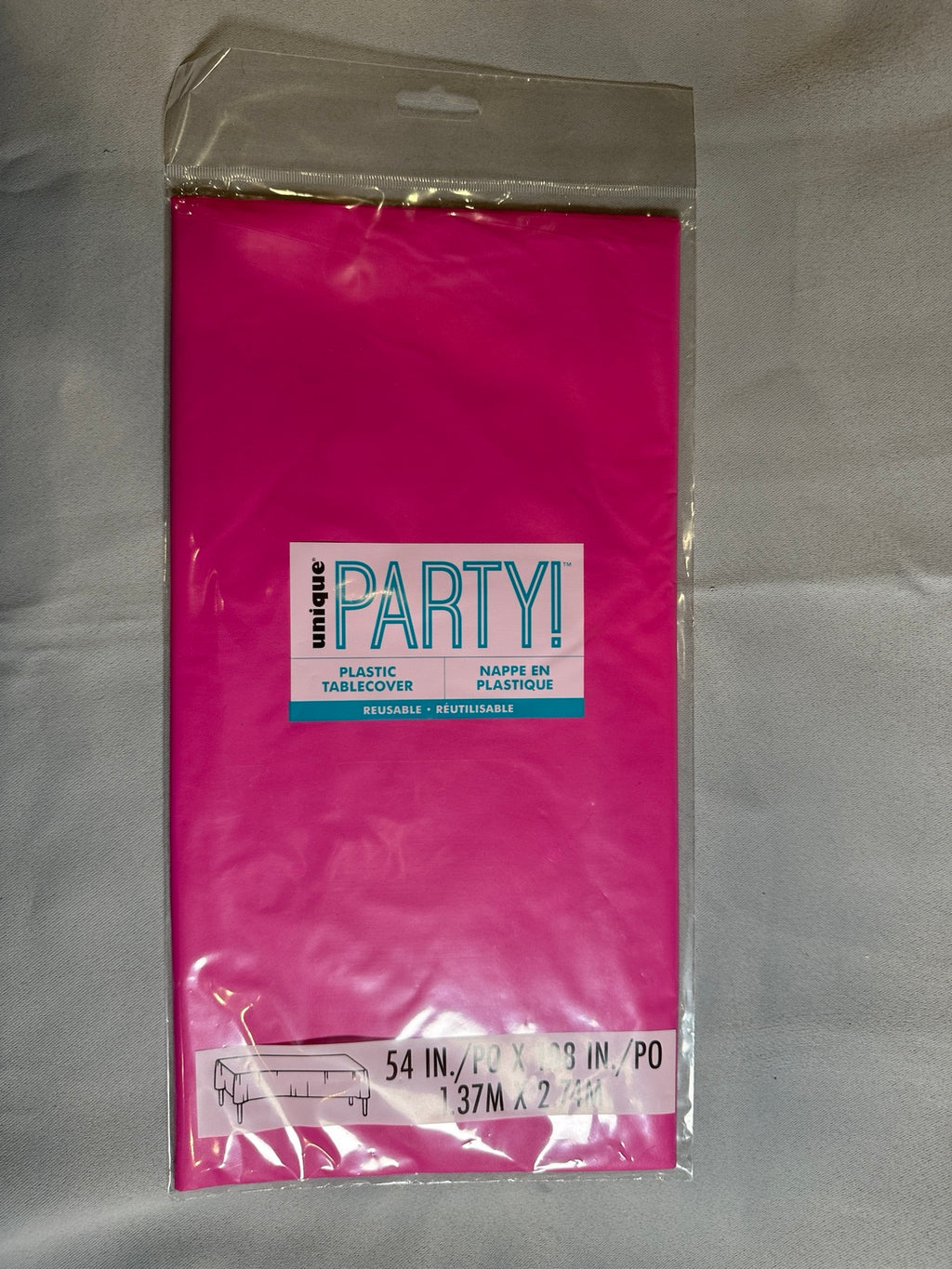 Unique Party neon pink rectangular plastic table cover front package